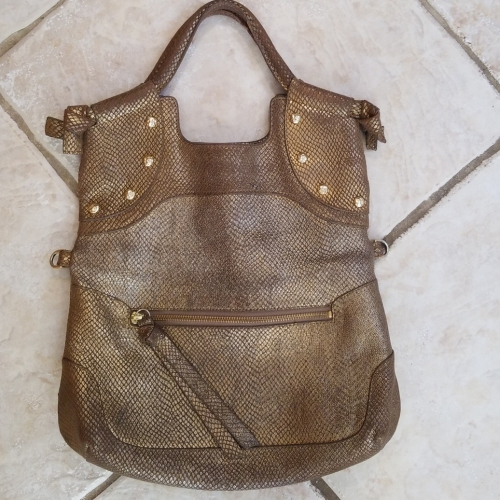 Foley and Corinna gold handbag